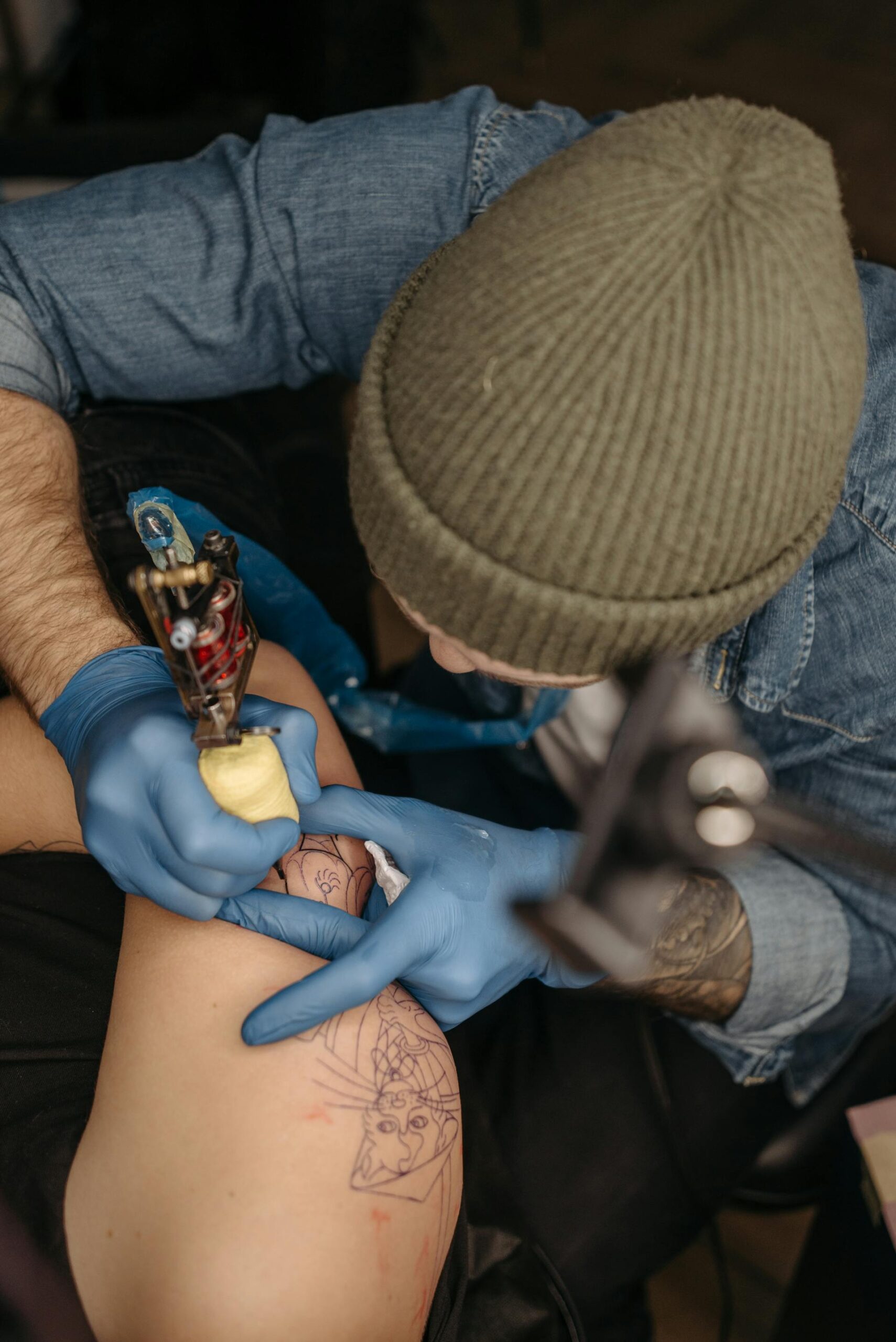 tattoo artist doing tattooing
